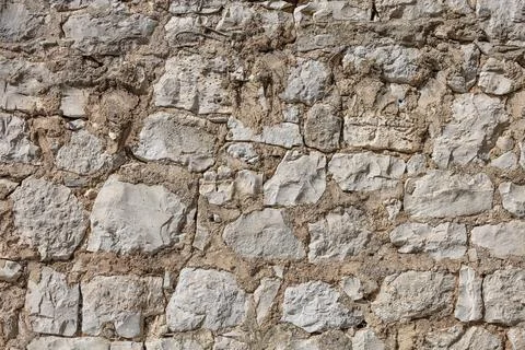 Rough Limestone Stone Wall Texture With Mortar Joints Rustic Masonry Backgr.. Stock Photos