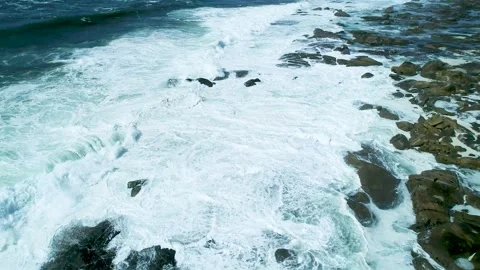 Rough marine environment featuring heavy swell and massive water splash on .. Stock Footage 336096820
