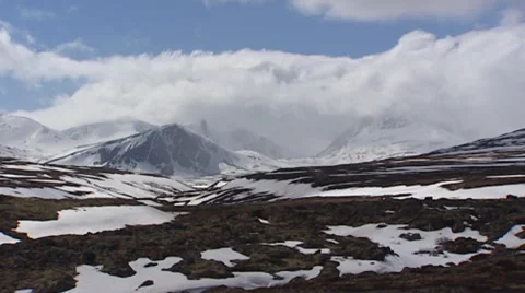 Rough mountain scenery + mountain top Snohetta in Dovrefjell NP, Norway Stock Footage 34490708