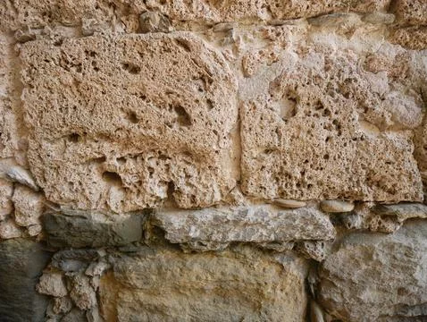 Rough Natural Stone Wall Texture with Large Irregular Blocks Stock-Fotos