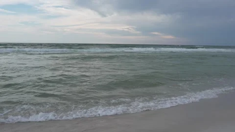 Rough ocean waves and stormy cloudy sky on a Florida beach, choppy water Video stock 345689646