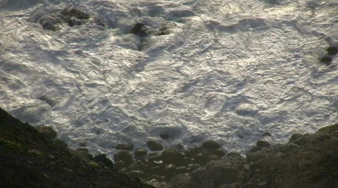 Rough ocean waves crash against the rocky San Francisco shoreline Stock Footage 360354