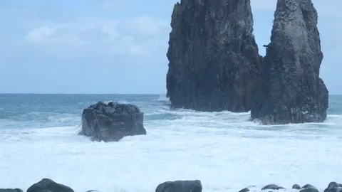 Rough ocean waves crashing against ribeira da janela rock formations Stockbeeldmateriaal 333695494
