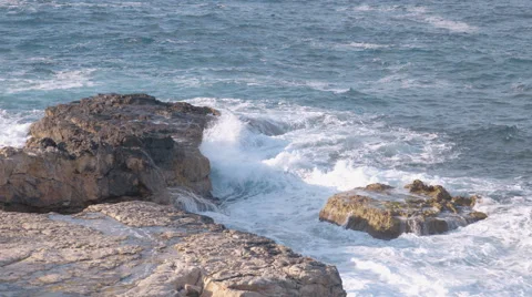 Rough ocean waves crashing into the Maltese shoreline Stock Footage 65405210