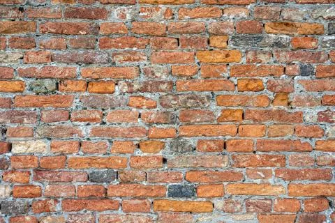 Rough old red brick wall Stock Photos