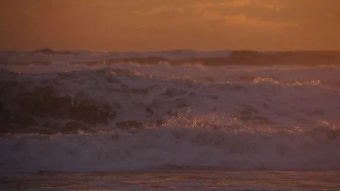 The rough orange Sea at rough sunset in summer in slow motion panoramic Stock Footage 127116610