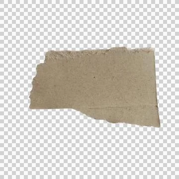 A rough piece of torn brown craft paper with ragged edges isolated on a tra.. Фото