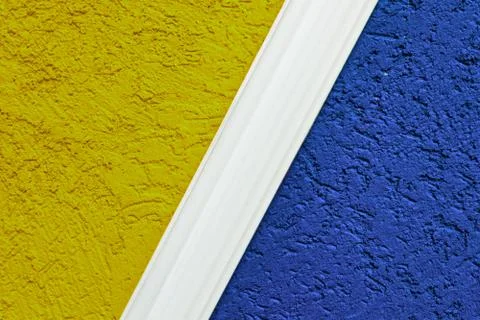 Rough plaster surface painted in a bright color. Variations of harmony and co Stock-Fotos