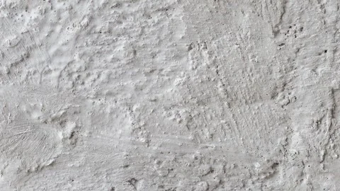 Rough plastered coarse light wall with divorces moving sideways 스톡 동영상 255033333