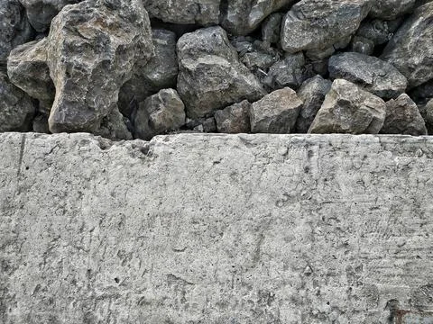 Rough raw and processed gray stone texture background Foto stock