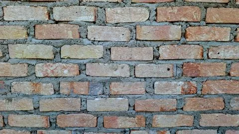 Rough Red Clay Brick Wall Texture with Grey Cement Mortar Lines Stock Photos