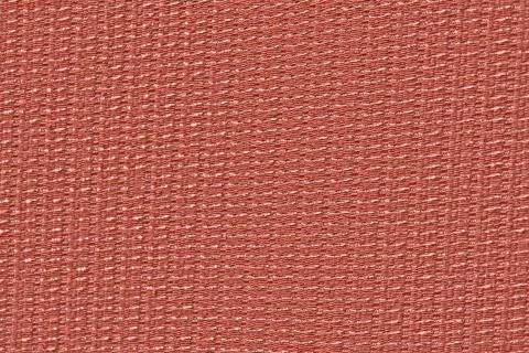 Rough red material with shiny inserts. Texture of fabric curtains with woven  Foto stock