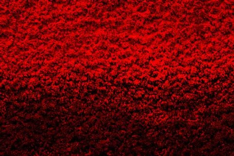Rough red surface with a gradient. Abstract background with space to copy. Foto stock