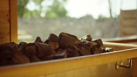 Rough Reddish Brown Rock Chunks in Metal Trough, Rustic Window Light, Close Up Vídeo Stock 341430612