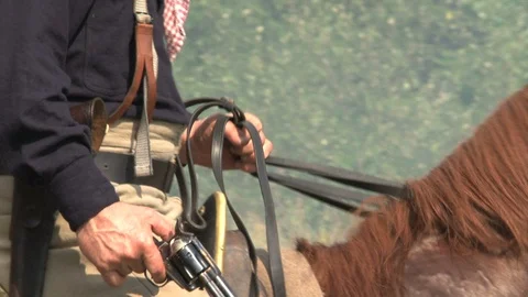 Rough Rider, Mounted  Teddy Roosevelt fires revolver - Spanish American War Stock Footage 106671453