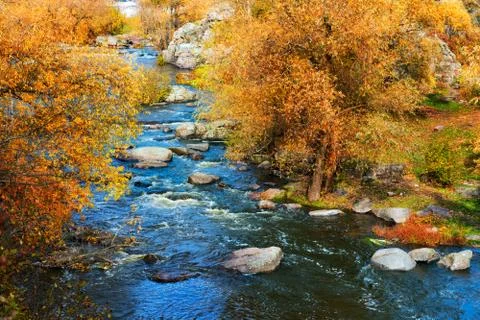 Rough river at autumn Photos