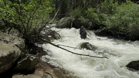 Rough river handheld slomo closeup 4k Video stock 314924379