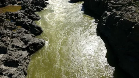 Rough river in a mountain valley panoramic shot Stock Footage 63452183