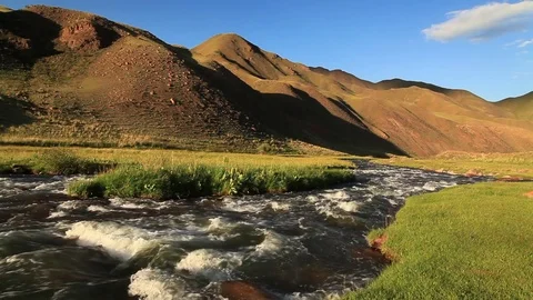 Rough river in the mountains. Kyrgyzstan Vídeo Stock 80412384