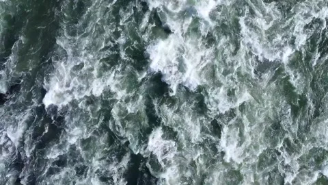 Rough river rapids top aerial drone view Stock Footage 142542977