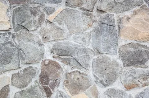 Rough rock wall background Stock Photos