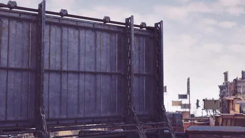 Rough rooftop scene showcasing weathered containers and city surroundings Stock Footage 331401274
