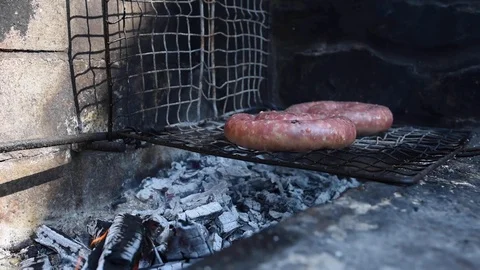 Rough sausages grilling Stock Footage 128798208