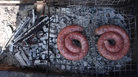 Rough sausages grilling Video stock 128798247