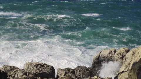Rough sea hitting Mediterranean coast Video stock 168775499