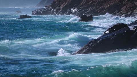 Rough sea ocean surf - waves breaking on the rocks Stock Footage 67376060