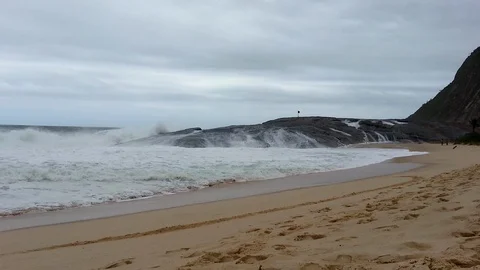Rough sea. Strong waves crushing Pampo Rock. Itacoatiara Beach, Rio de Janeir Stock Footage 121597503