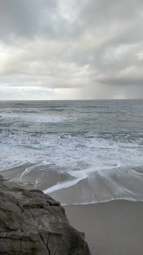 Rough seas on a beach on the Cantabrian coast of Spain Stock Footage 327190640
