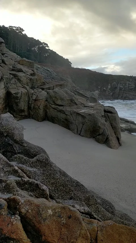 Rough seas on a beach on the Cantabrian coast of Spain Stock Footage 327190646