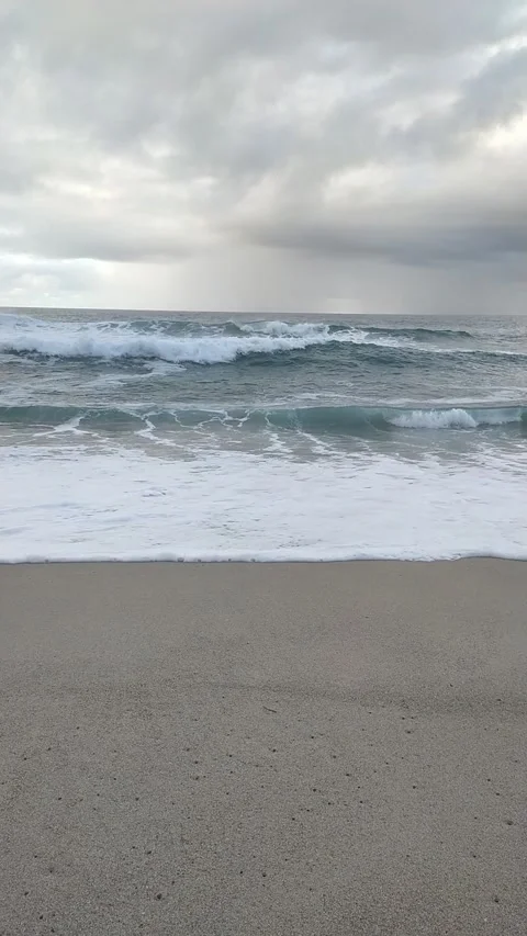 Rough seas on a beach on the Cantabrian coast of Spain Stock Footage 327190654