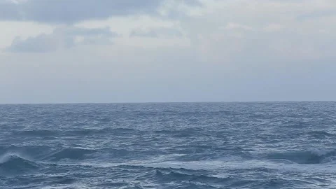 Rough seas on the coast with light rain Stock Footage 147077051
