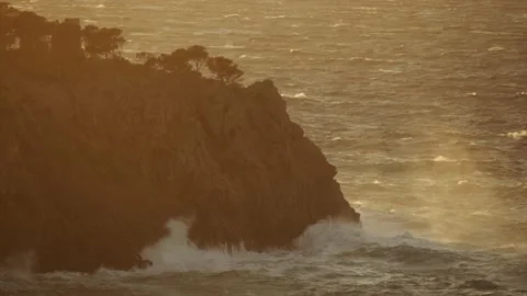 Rough seas hitting coastal cliff on Mediterranean island Stock Footage 168776730