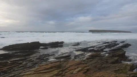 Rough seas overlooking the Brough of Birsay in Orkney in 4k Stock Footage 289676257