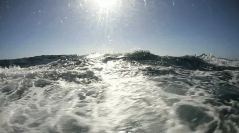 Rough seas though a Pacific port hole Stock Footage
