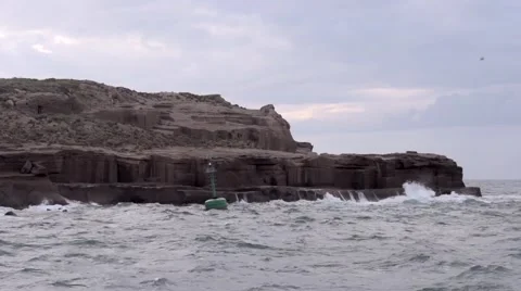 Rough seas with waves crashing on tuff cliffs on Ventotene Island, Italy 스톡 동영상 42258236
