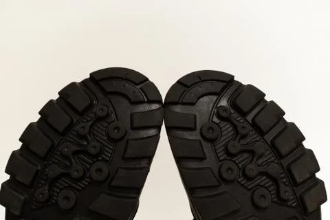 Rough sole made of durable rubber of old boots Stock Photos