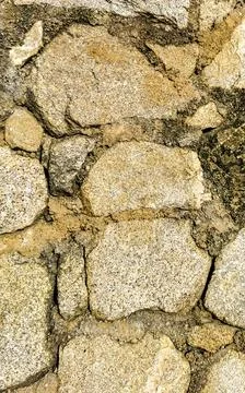 Rough stone and brick wall texture pattern Puerto Escondido Mexico. Stock Photos