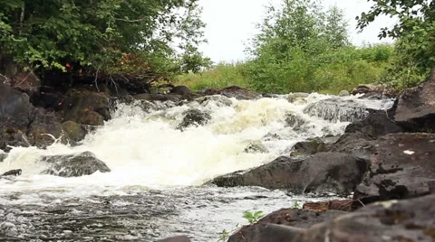 Rough stone roll on a small river Video stock 41469930