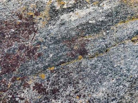 Rough stone surface from close with  moss texture Stockfoto's