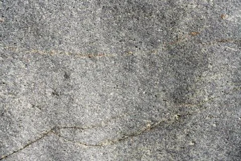 Rough stone surface grey color. Detailed nature background or pattern texture Stock Photos