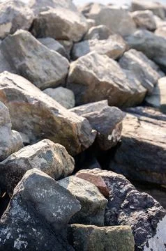 Rough stone surface at the seaside Stock Photos