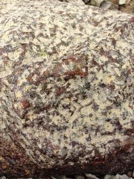 Rough stone surface with speckled natural pattern Stock Photos