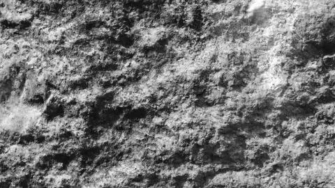 Rough stone wall close up. Stock Photos