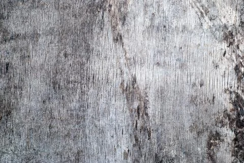 Rough stone wall with cracks of grey Stock Photos