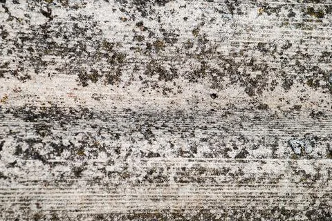 Rough stone wall with cracks of grey Stock Photos