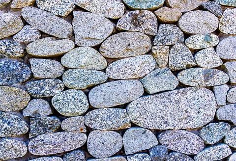 Rough stone wall as creative background texture. Natural stones masonry wit.. Stock Photos